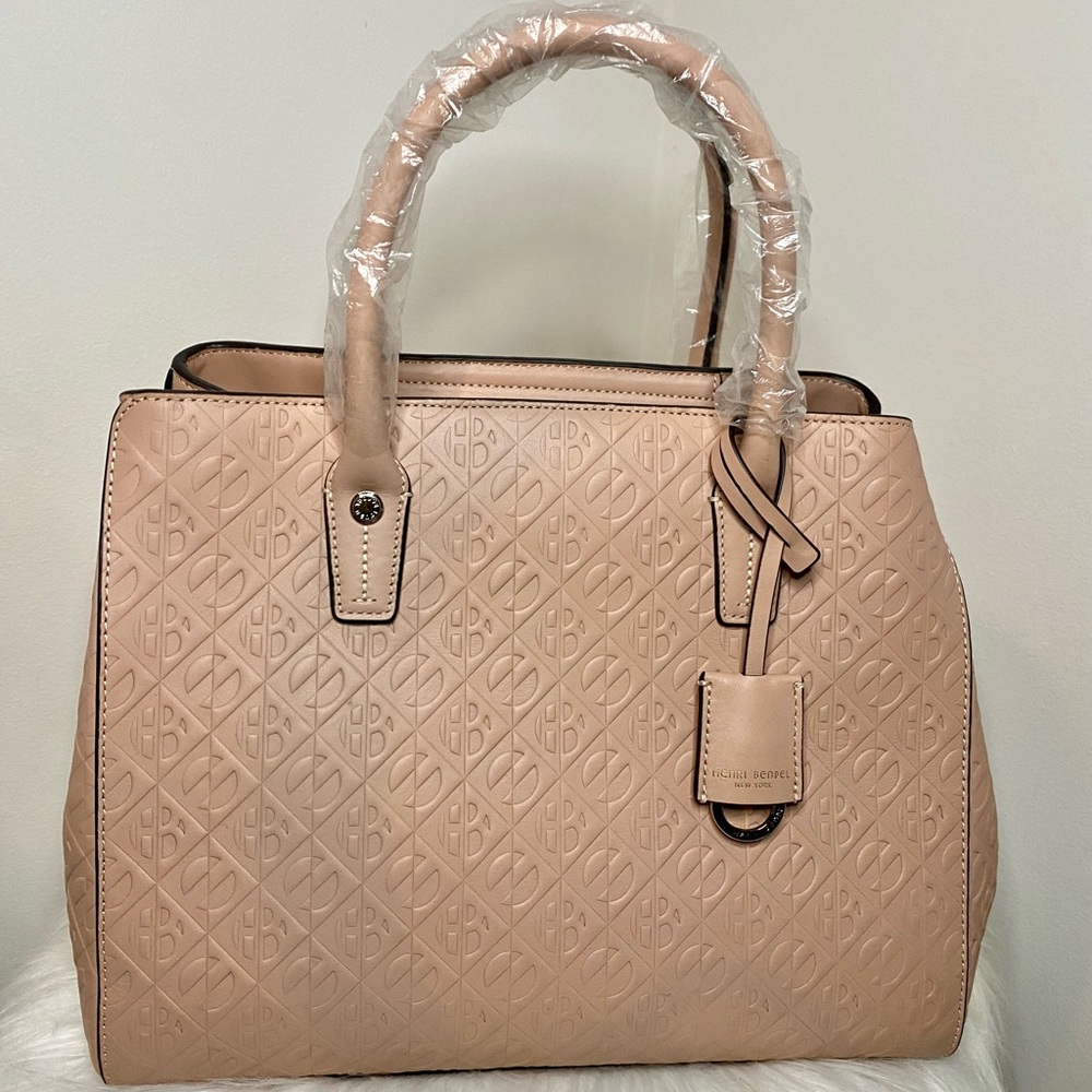 Pink Henri Bendel monogrammed hand bag. Never used and just like new.